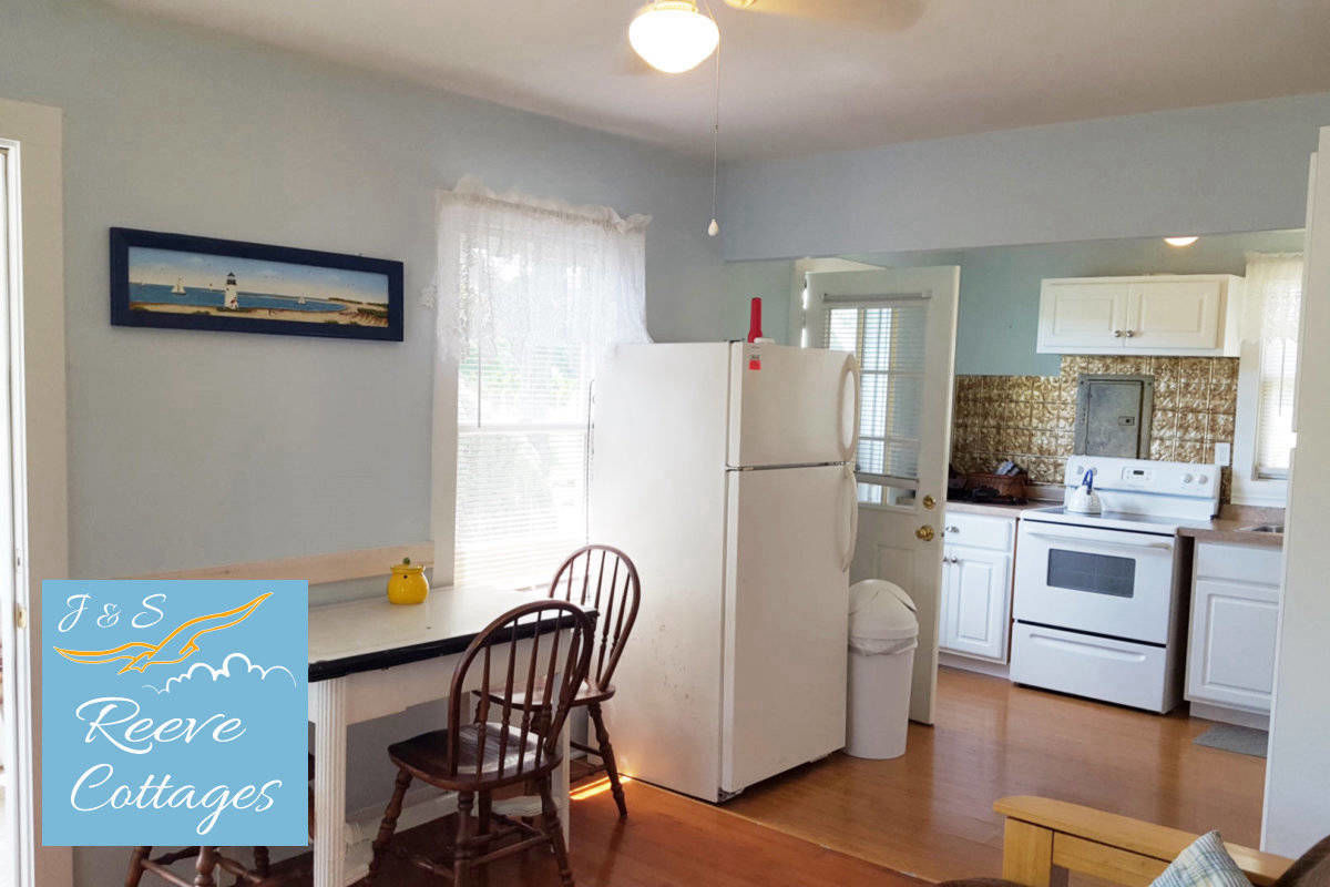 Cozy Waterfront Cottage 5 shows a different angle of the interior of Living Room Facing Kitchen