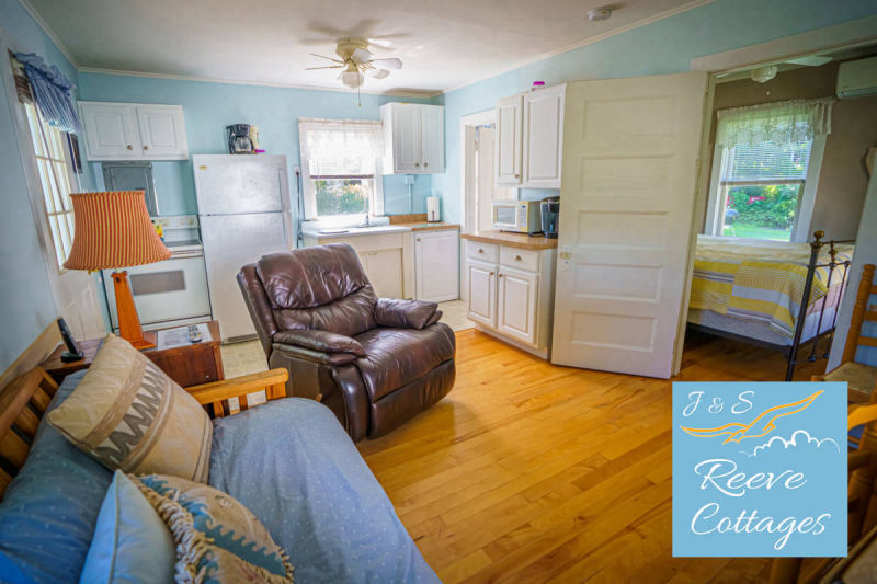 Cozy Waterfront Cottage 6 shows a different angle of the interior of Living Room Facing Kitchen